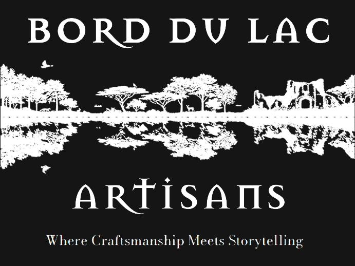 Bord Du Lac Logo reversed colours with an iconographic of the lake scene and tagline: Where Craftmanship Meets Storytelling.